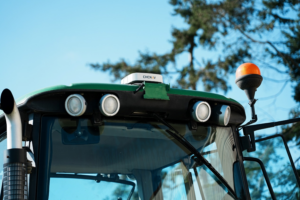 CHCNAV auto steering system in a tractor cabin.
